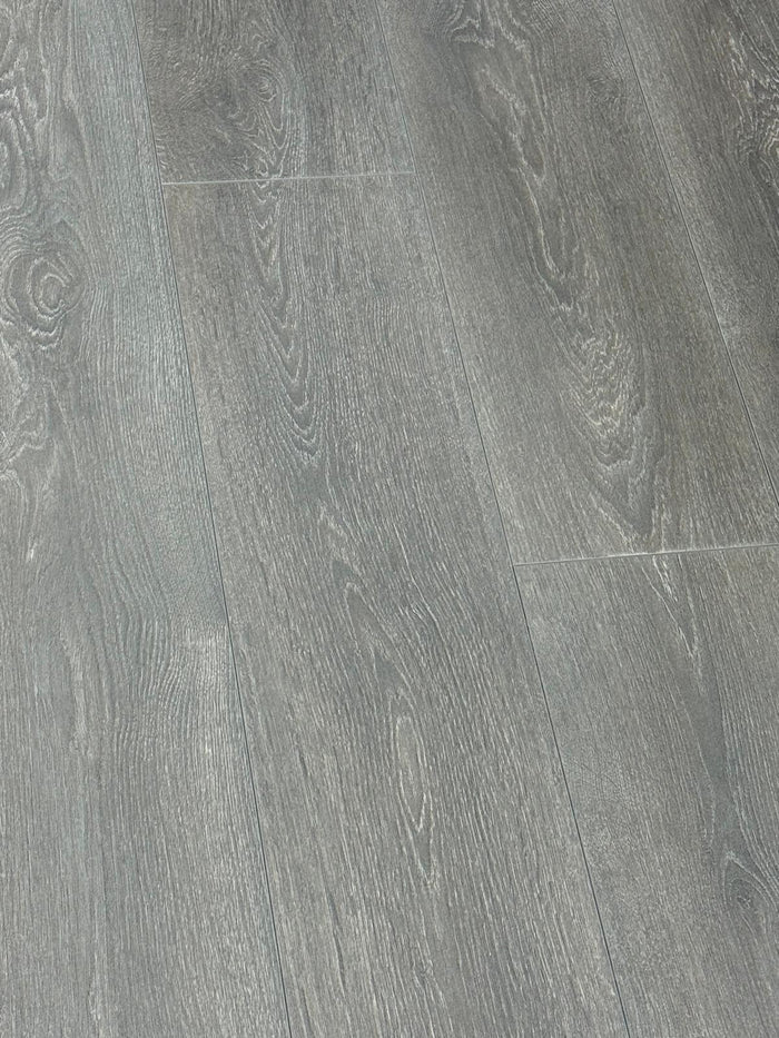 $0.79/sf BRIAR OAK 8mm Laminate