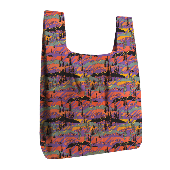 Reusable shopping bag with a colorful mountain pattern on a white background