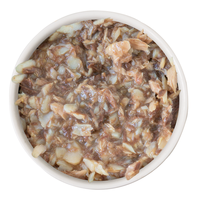 A white bowl holds Soulistic Aqua Grill, moist and chunky cat food made with wild-caught tuna and flaked tilapia in savory gravy, set against a white background.