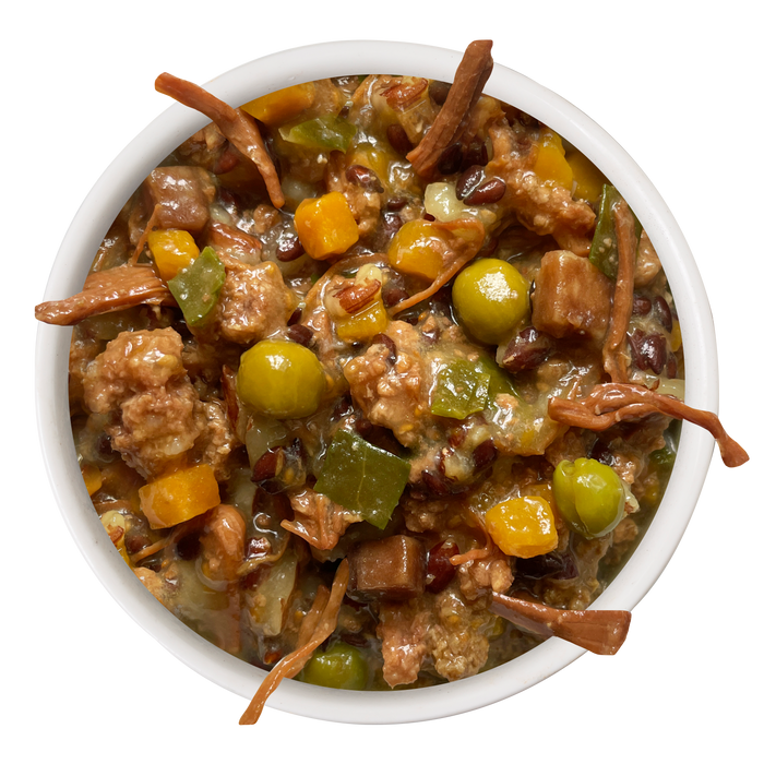 A white bowl filled with Awesome Functions' Awesome Everything Beef & Red Rice Recipe with Veggies, featuring Australian grass fed beef, peas, corn, green peppers, and brown noodles in a thick savory sauce for whole body wellness.