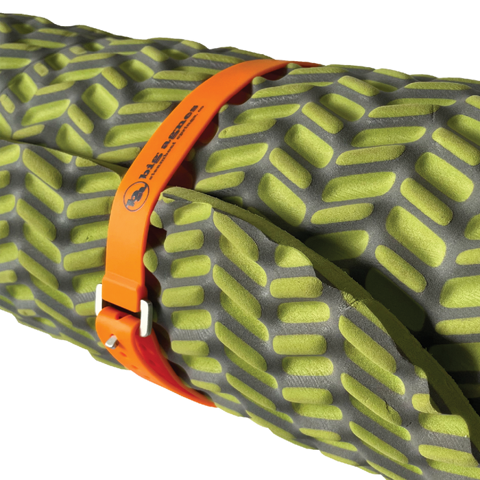 Close-up of a green and gray inflatable sleeping pad with an orange strap.