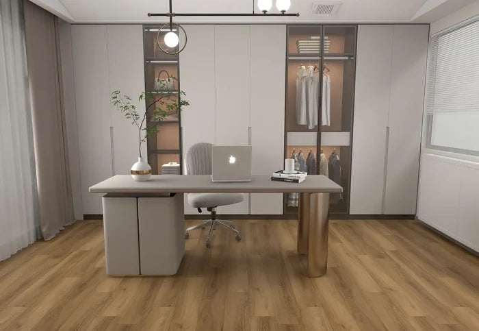 Modern office space with a desk, chair, and computer setup.