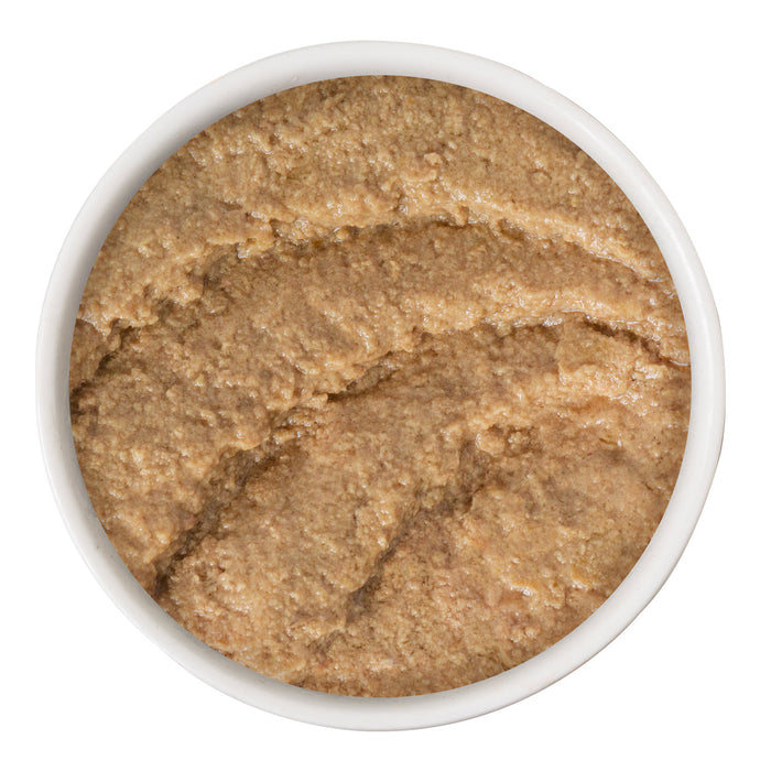 A white bowl filled with smooth, light brown Chicken & Beef Best Buds grain free spread by BFF Best Feline Friend, shown from above on a white background.