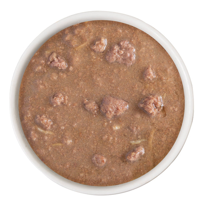 A white bowl filled with BFF Best Feline Friend Chicken Charge Me Up grain free wet food in gravy, perfect for cats who love gravy, viewed from above on a white background.
