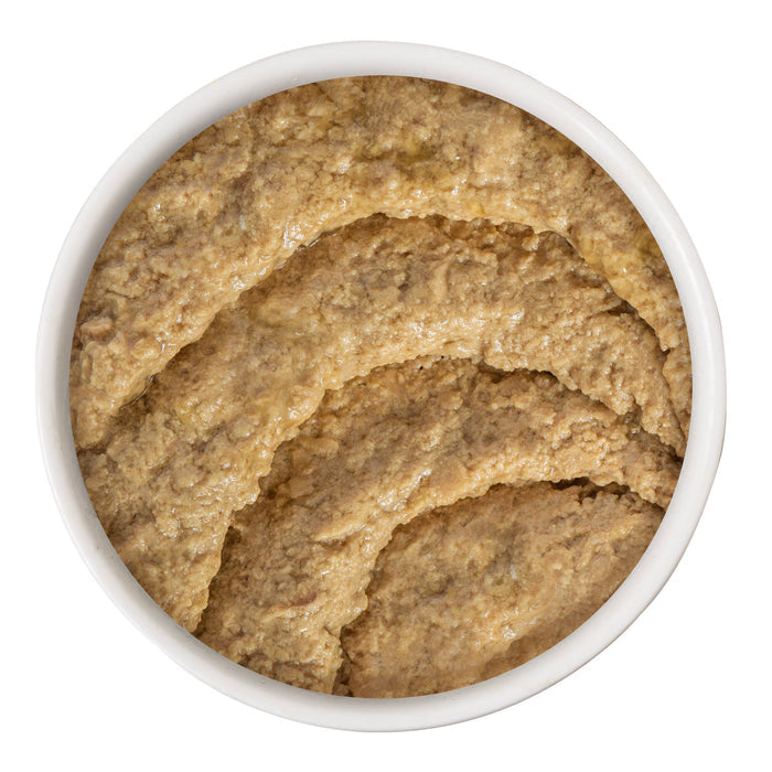 A white bowl filled with smooth, brownish Chicken & Duck Destiny pâté from BFF Best Feline Friend, made with cage-free chicken, shown from above on a white background.