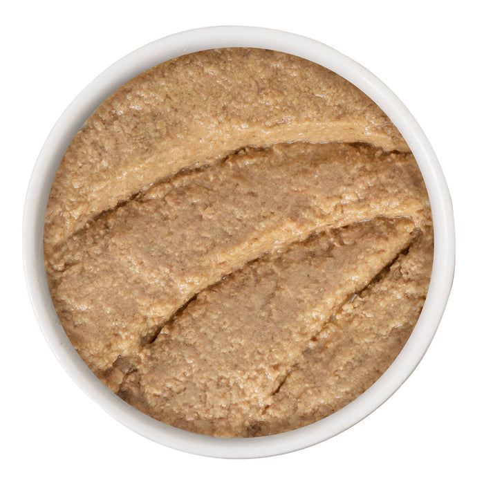 A white bowl filled with smooth, light brown BFF Best Feline Friend Chicken, Duck & Turkey Take a Chance paté, shown from above with visible textured swirls on the surface.