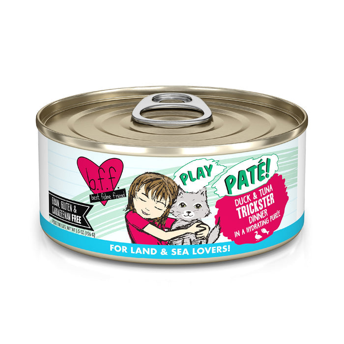 A can of BFF Best Feline Friend Duck & Tuna Trickster cat food features a playful turquoise label with a girl hugging a gray cat, highlights grain-free cage-free duck and wild-caught tuna.