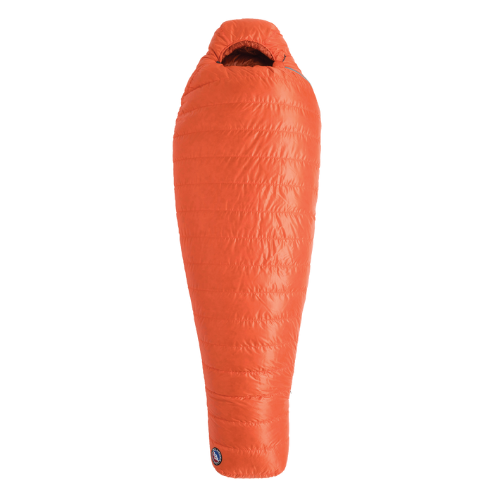 The Big Agnes Returns Greystone 20° is a bright orange, mummy-style sleeping bag with DownTek insulation and a hood, shown vertically against a white background—ideal for backpacking adventures.