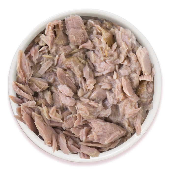 A white bowl filled with Kawa Booty wild-caught kawakawa tuna in light brine by TruLuxe, viewed from above on a white background—ideal as refined nutrition or luxury cat food for your feline companion.