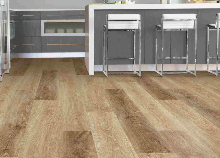 Modern kitchen with Metal Smoke from Mohawk SolidTech Explorer's Cove luxury vinyl plank 5mm  installed.