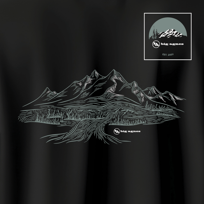 Black t-shirt with mountain design and 'big agnes' logo on a dark background