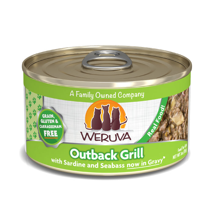 Weruva Outback Grill cat food features sardine and trevally in gravy. Its green and tan label shows cats and notes the recipe is free from grains, gluten, and carrageenan.