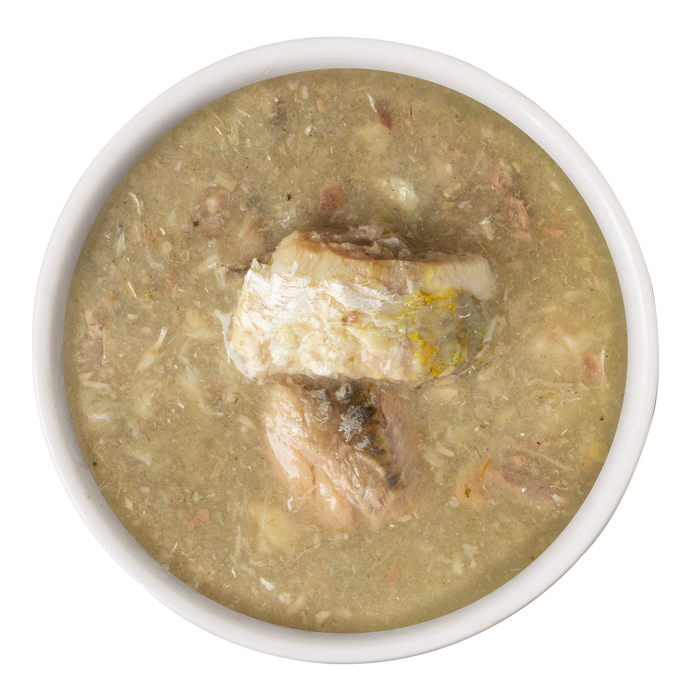 A bowl of Weruva Outback Grill, featuring thick light brown soup with two barramundi pieces on top. The slightly chunky texture makes it a delicious pick for any seafood lover.