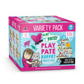 A vibrant box of BFF Best Feline Friend PLAY Paté Buffet cat food variety pack, showing illustrated cans, a girl with a gray cat, and labels for 18 grain-free paté cans with cage-free chicken, gluten & carrageenan free.