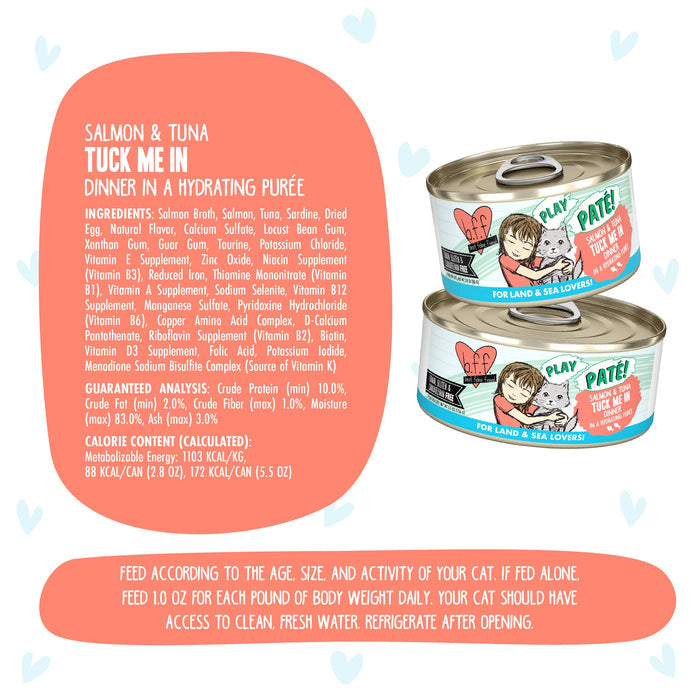 Two cans of BFF Best Feline Friend Salmon & Tuna Tuck Me In cat food are shown. The colorful labels feature playful cat art and highlight wild-caught salmon. Ingredients and feeding info appear on a white background with blue heart accents.