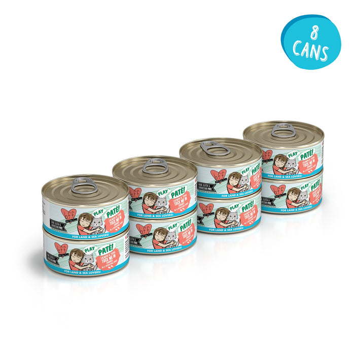 Four cans of BFF Best Feline Friend Salmon & Tuna Tuck Me In grain free Paté cat food, featuring wild-caught salmon and tuna recipes, a cat illustration, teal and red text, and an “8 cans” blue circle in the top right.