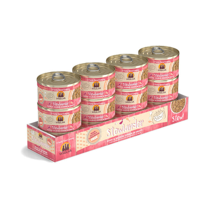 A 12-pack of Weruva Stewlander “Stew!” cat food cans, featuring beef and wild-caught salmon in gravy, rich in omega-3s for your cat’s health. Comes in a pink and beige tray.