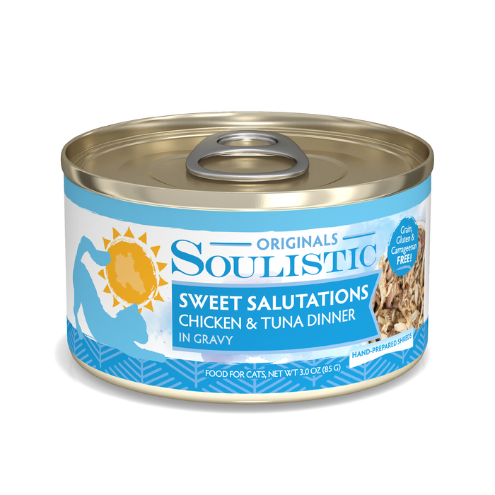 A can of Soulistic Sweet Salutations cat food features blue packaging with a cat silhouette and sun, containing wild-caught tuna and boneless chicken in nourishing gravy. It’s grain, gluten, and carrageenan free.