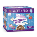 A purple box of Cats in the Kitchen The Coolsville Catch! features 12 cans of high-protein cat food with wild-caught salmon, playful cat art, and a grain, gluten, and carrageenan free formula.