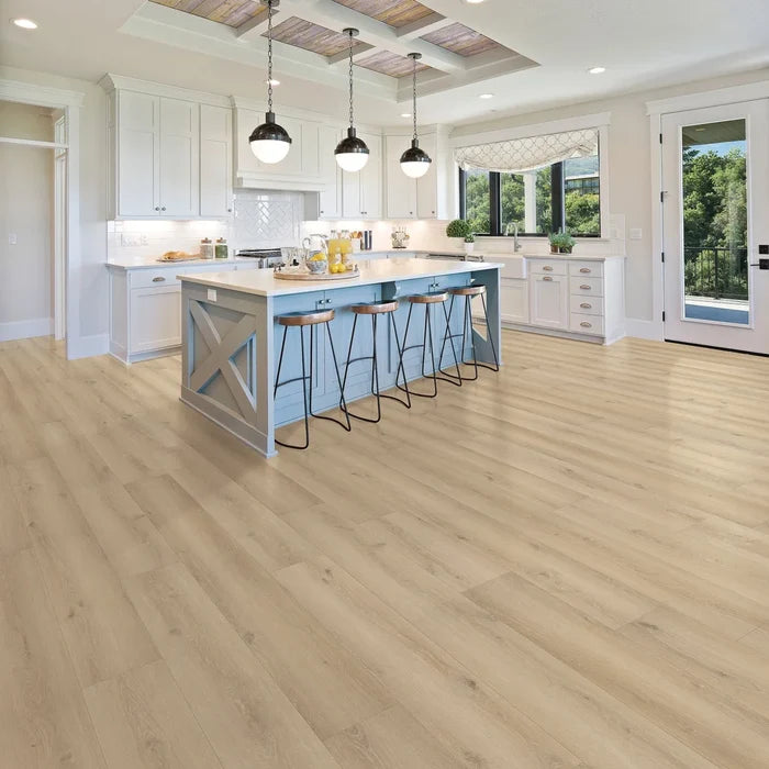 Modern kitchen area with Toasted Almond Oak WPC vinyl plank flooring – light brown oak tone, wood texture, waterproof and durable for busy Canadian households.