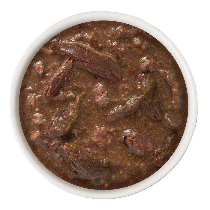 A white bowl filled with chunky Tuna & Beef Baby Cakes by BFF Best Feline Friend, featuring tender pieces in a hearty broth, viewed from above on a white background.