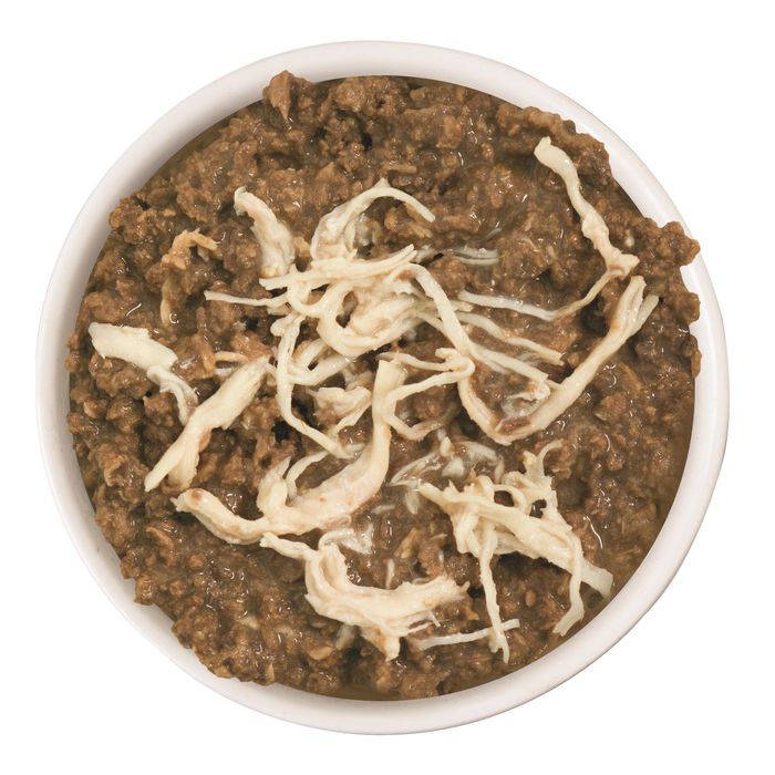 A white bowl filled with BFF Best Feline Friend Tuna & Chicken 4Eva cat food, topped with shredded cheese, on a white background.