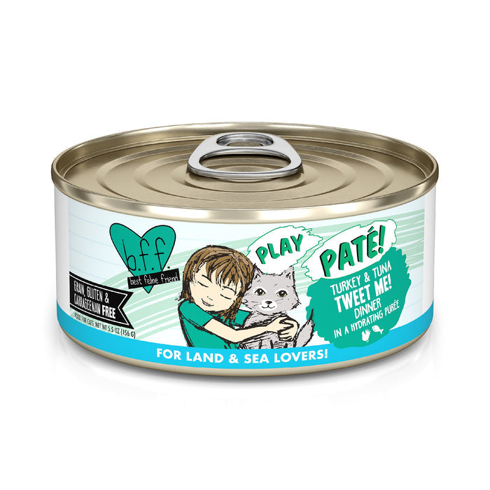 A can of BFF Best Feline Friend Turkey & Tuna Tweet Me! cat food, with cartoon art of a child hugging a cat. The label highlights turkey and wild-caught tuna in hydrating purée, and is gluten and grain free.
