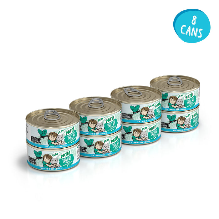 Four stacks of two cans each of BFF Best Feline Friend Turkey & Tuna Tweet Me! grain-free pate wet cat food, with teal and white labels featuring a cartoon cat and fish, plus an "8 cans" label in blue at the top right.