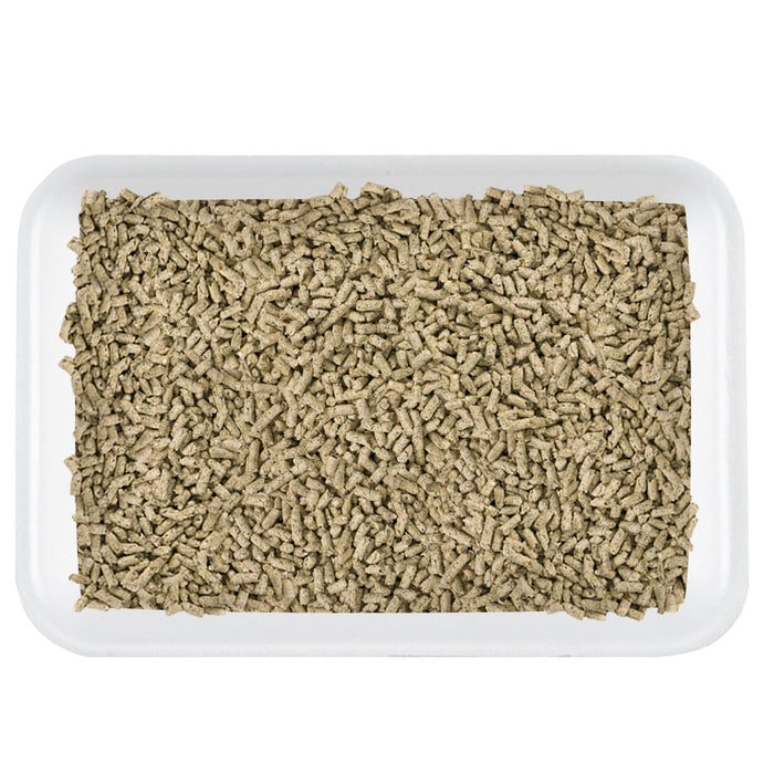 A white rectangular tray filled with small, brown, pellet-shaped pieces of Weruva Cat Litter from the Weruva brand.