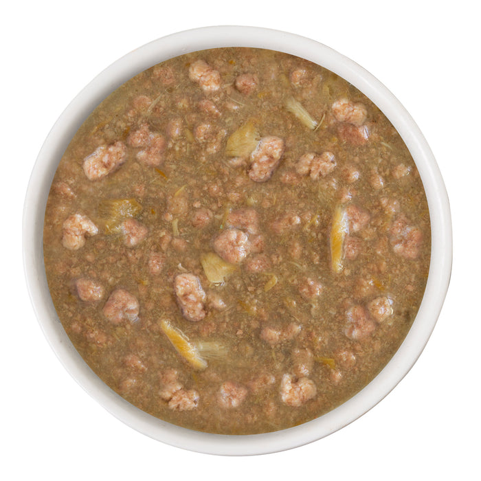 A white bowl containing chunky, brownish wet food with small meat-like and lighter bits, Weruva’s What a Crock recipe made with wild-caught salmon and cage-free chicken, photographed from above on a white background.