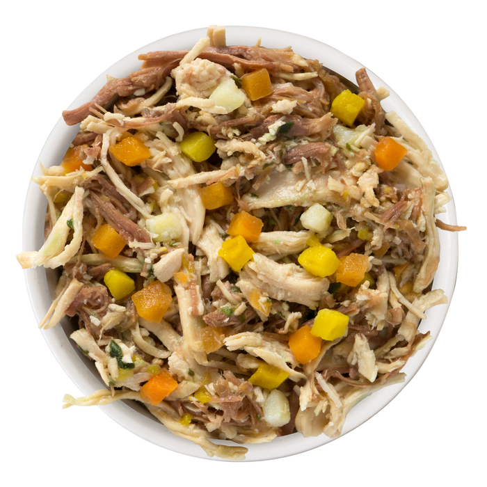 Viewed from above on a white background, Weruva’s Wok The Dog features shredded grass-fed beef mixed with diced carrots, yellow corn, and bits of onion—a tasty way to elevate your dog’s mealtime.
