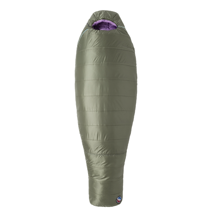 Green sleeping bag with purple interior on a white background